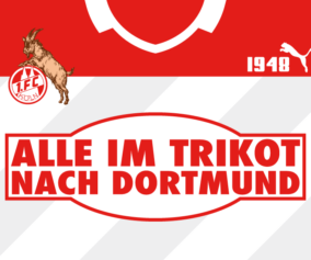 "Alle im Trikot nach Dortmund!"-Schriftzug auf einem FC-Trikot.